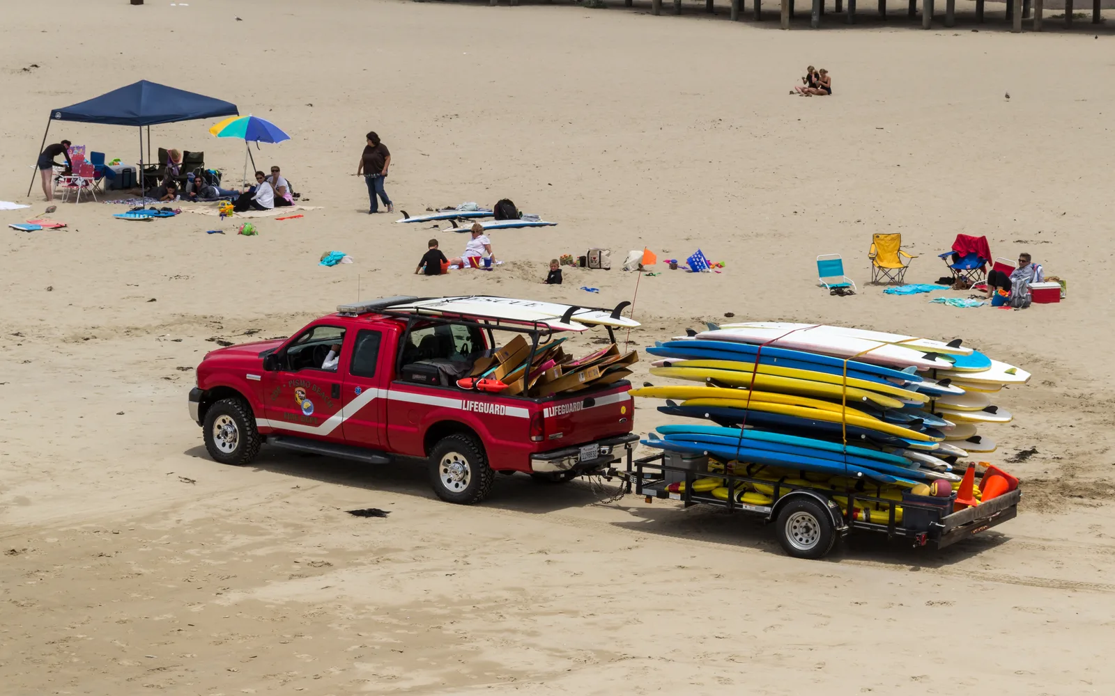 Pismo Beach coastline with sandy shores and people enjoying the California coast